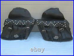 Vintage leather saddlebags throw over motorcycle Harley Indian conchos lace