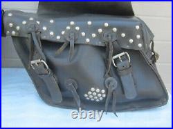 Vintage leather saddlebags throw over motorcycle Harley Indian conchos lace